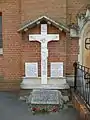 The war memorial next to the main entrance.