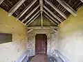 15th century porch & south door with rare 'stepped' cross