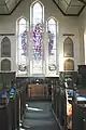 Church interior with east window