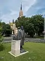 Statue of Lechner by Ildikó Zsemlye in Kőbánya