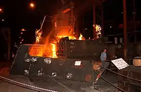 Steel from the World Trade Center is poured for construction of USS&nbsp;New York