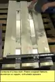 Innards of bus duct showing plastic wrappings of sandwiched busbars and hollow plastic tube spacers.