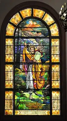Stained glass of "Moses with the Tablets", a surviving piece of the old Temple De Hirsch, landmarked but nonetheless demolished.