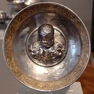 A Roman gilded silver bowl depicting the boy Hercules strangling two serpents, from the Hildesheim Treasure, 1st century CE, Altes Museum