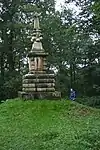 "Four Faces" statue in Pretty Wood c. 1727 by Hawksmoor