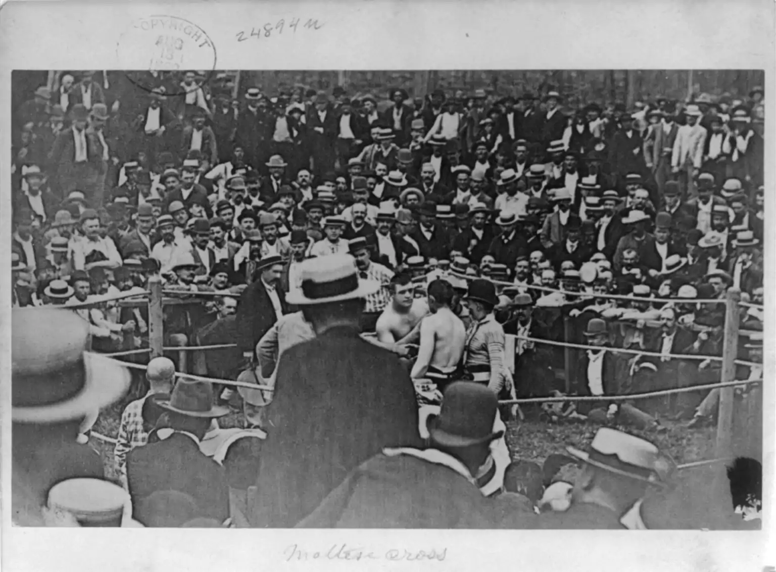 John L. Sullivan stares down Jake Kilrain seconds prior to their prizefight