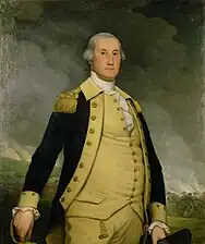 A three-quarter-length portrait of a man in dark coat with a collar, shoulder tassels, vest and trousers all in gold, standing with a sword and hat in hand against a background of a battlefield with cannons and soldiers under a cloudy sky