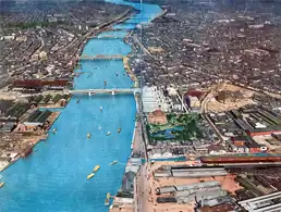 An aerial view of the Sumida River with Taitō-ku (west) and Sumida-ku (east) in Tokyo, c. 1930