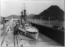 Hyperboloid mast towers were on the USS&nbsp;Arizona, in lock, Panama, 1921.