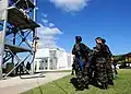 The Fleet Anti-terrorism Security Team demonstrates fast rope techniques for Moroccan sailors at the NMIOTC in Souda Bay, Greece, during exercise Phoenix Express.