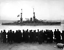 Hyperboloid mast towers were on the USS&nbsp;Arizona, passing the 96th St. Pier in New York City, circa December 26, 1918.