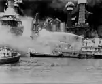 Hyperboloid mast towers were on the USS&nbsp;West Virginia aflame at Pearl Harbor on December 7, 1941.