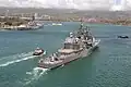 Vincennes pulls into port at Pearl Harbor, Hawaii, on 15 April 2005. USS&nbsp;Missouri is visible in the background.