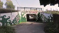 A painted viaduct located near Ken-Well Park.
