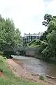 View of Monmouth Museum from Vauxhall Fields, including the River Monnow