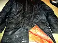 A vintage Lord Anthony snorkel parka surviving after 30 years.  It is now rather grubby and the nylon shell is shiny from wear but it's still a warm functional jacket.