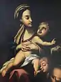 The Virgin and Child with infant John the Baptist by Pierre Guillemin (1732) located at St George's Basilica.
