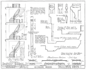 Interior details: the main spiral staircase, door casings and base boards.