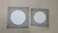 6-inch (150&nbsp;mm, left) and 5-inch (125&nbsp;mm, right) wire gauze squares