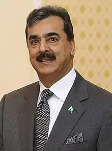 A shot of a man during a meeting.